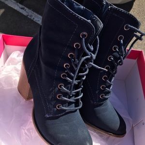 Navy heeled boots,tan heel, good condition